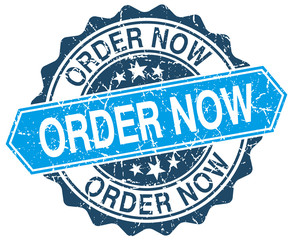 order now blue round grunge stamp on white
