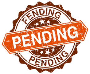 pending orange round grunge stamp on white