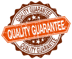 quality guarantee orange round grunge stamp on white