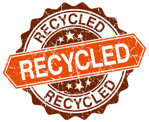 recycled orange round grunge stamp on white