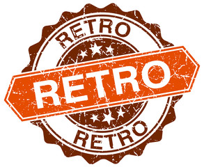 Obraz premium retro orange round grunge stamp on white