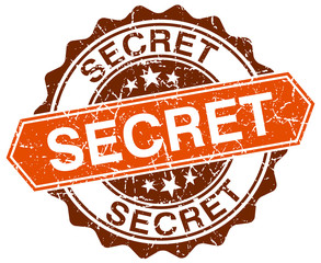 secret orange round grunge stamp on white