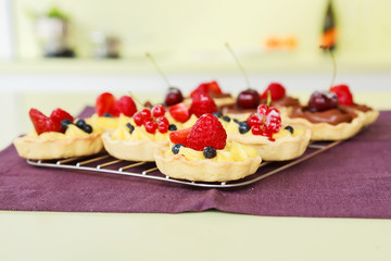 Fresh tartalets with berry fruits and cherries