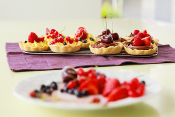 Fresh tartalets with berry fruits and cherries