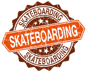 skateboarding orange round grunge stamp on white