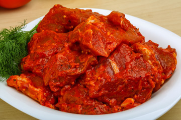 Raw marinated meat for bbq