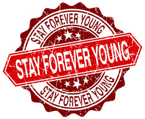 Obraz premium stay forever young red round grunge stamp on white