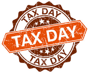 Obraz premium tax day orange round grunge stamp on white