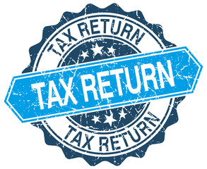 tax return blue round grunge stamp on white