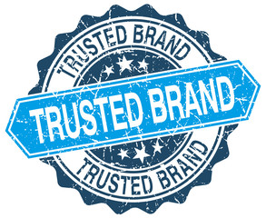 Fototapeta premium trusted brand blue round grunge stamp on white