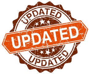 updated orange round grunge stamp on white