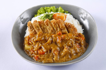 Deep fried pork with rice and curry sauce in japanese style - Tonkatsu Kare