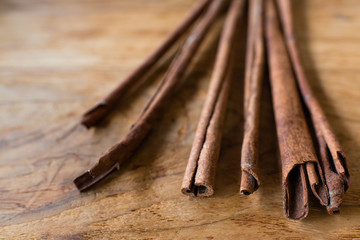 Cinnamon Stick on Wooden Background