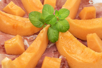 appetizing starter of ham and melon