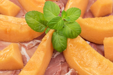 appetizing starter of ham and melon