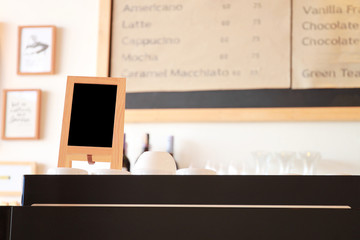 Menu frame on counter in cafe