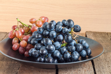 Grapes in black plate
