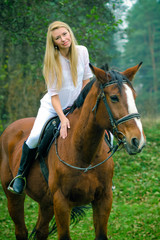 Obraz premium Romantic girl in a white horse. beautiful girl and a horse