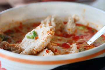 Tom yum soup with fish.
