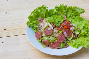 Chinese Sausage Salad on wood background