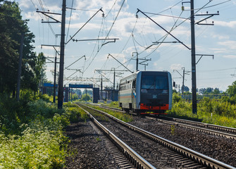 Plakat Electric train goes by rail, summer, countryside