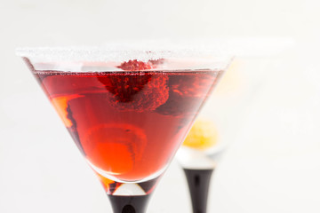 Red cocktail with raspberry