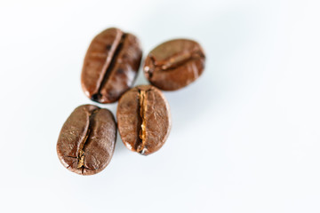 Four coffee Beans  on white background