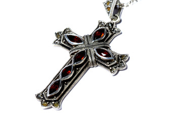 Cross necklace crucifix.
Crucifix cross necklace isolated on white background.