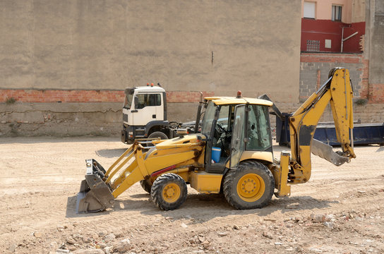 excavadora y camion
