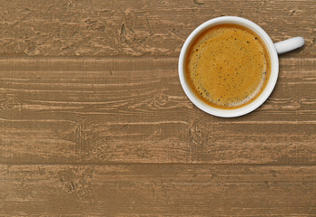Coffee cup on wood