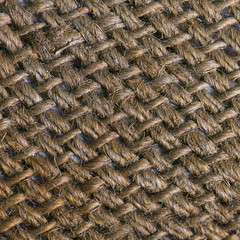 Hessian sackcloth woven texture pattern background in yellow beige cream sepia brown color
