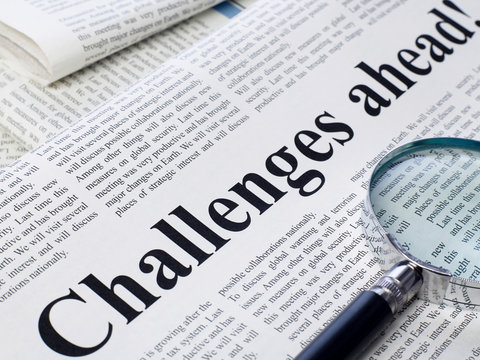 Challenges ahead headline on newspaper