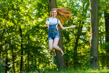 Beautiful smiling red-haired young woman