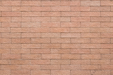 Brown brick wall texture background.