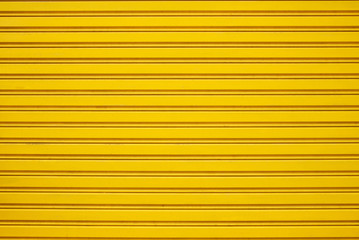 Yellow steel roller shutter door