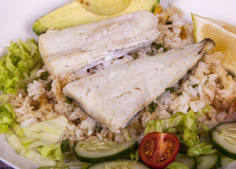 Closeup of Baked Fish with Fried Rice and Salad