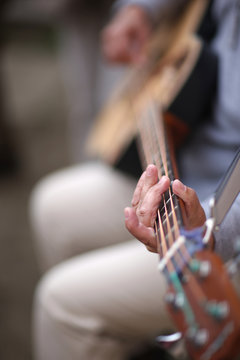 Closeup of guitarist playing