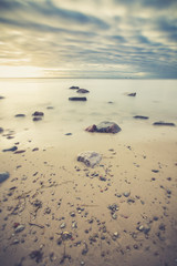 Sunrise over the sea. Beautiful long exposure landscape of rocky