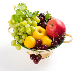  Various fruits in colander