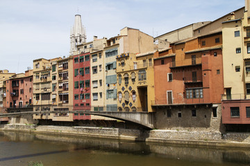 Fototapeta na wymiar Colorful old building line the river.Girona,Spain