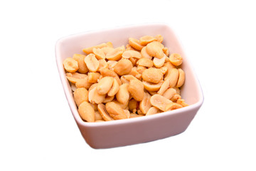 Salted nuts on bowl on white background