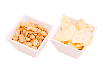 Square bowls of pretzels on a white background