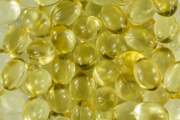 Vitamin D capsules extreme close up texture