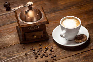 Cappuccino, coffee and  coffee-mill