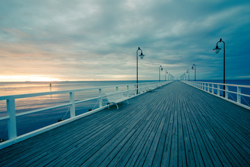 Gdynia Orlowo pier. Vintage photo of Baltic sea shore seascape.
