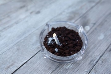 ashtray of cigarettes