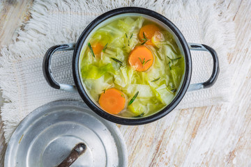 Cabbage soup in a pot