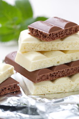 Slices of dark and white chocolate