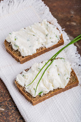 Healthy breakfast - homemade bread with goat cheese