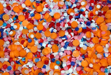 many bottles caps of colored plastic
